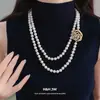 Collar de Perlas con Flor de Zirconia Hueca, Lujo Ligero y Sensación de Alta Gama, Cadena para Suéter de Nicho, Collar con Temperamento de Moda Retro al por Mayor