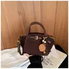 Bolso cubeta personalizado casual de moda con una textura simple y moderna, nuevo modelo principios de otoño 2026 para mujer, de hombro y cruzado