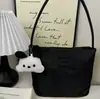 Bolso coreano de recuerdo Tela de nailon Bolso original para mujer Regalo Bolso de moda para mujer Bolso de axila Bolso de hombro versátil