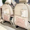 Bolsa de almacenamiento para coche Blue Rain, con un lindo diseño de oso y conejo, hecha de cuero, para usar en los asientos del coche para evitar patadas y proteger el respaldo.; una bolsa de almacenamiento estilo caricatura para mujer