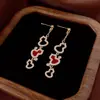 Pendientes de Calabaza con Aguja de Plata Galvanizada en Oro Real Piedra Ojo de Tigre Moda Lujo Ligero Temperamento Pendientes de Botón Personalidad de Nicho Pendientes de Gama Alta