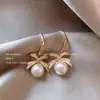 Pendientes de Perlas de Imitación Estilo Barroco de Gama Alta Pendientes de Diamantes Destellantes con Lazo de Nicho Lujo Accesible Pendientes Nuevo Estilo Caliente 2025