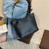 Bolso de Hombro Retro Transfronterizo 2026 Nuevo de Nicho Casual Versátil para Mujer, Gran Capacidad para el Trabajo, Bolso de Mano Versátil