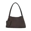 Textura de alta gama Transfronterizo 2026 Nuevo Estilo Moda Nicho Textura Tejida Bolso de Mano Bolso Baguette para Mujer Viaje al Trabajo Hombro Único Barra
