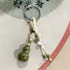 Chaveiro de Cerâmica Gourd de Jingdezhen Estilo Étnico Bolsa Tecida Pendurar Barraca de Mercado Noturno Literário Joias Pequenas Atacado em Estoque