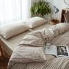 Juego de cama de cuatro piezas de algodón teñido en hilo, algodón lavado al agua, estilo japonés sin estampado, algodón de fábrica, suministro al por mayor de ropa de cama