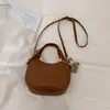 Bolso Cubo de Nicho Estilo Coreano para Mujer Modelo Nuevo Primavera 2026 Bolso de Hombro Cruzado Versátil Elegante de Alta Calidad