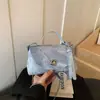 Bolsa Tote Pequena Super Moderna para o Dia a Dia Feminina 2026 Nova Moda Primavera Popular Bolsa de Ombro Único Toque de Luxo Bolsa Quadrada Pequena Transversal