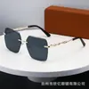2025 Nuevas Gafas de Sol para Mujer Sin Marco de Alta Calidad Lujo Ligero Populares en Internet Transfronterizas Europeas y Americanas Gafas de Sol con Protección UV para Sesiones de Fotos Callejeras