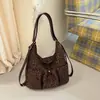 Bolsa transversal feminina 2026 nova tendência outono vintage nicho estampa de leopardo para ir ao trabalho bolsa de ombro única mochila de grande capacidade