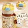 Botella de agua térmica Snoopy de acero inoxidable 316, diseñada para niñas, con un aspecto elegante, perfecta para que los estudiantes la usen en la escuela, cuenta con un asa para transportarla fácilmente y una tapa de tipo pop-up