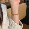 Popular Colgante de Hilo Rojo Xiaohongshu Pulsera de Cuerda Roja de Año Nuevo para Mujeres en su Año Zodiacal, Año del Caballo, Pulsera de Cuerda Trenzada Roja, Una Pieza al por Mayor