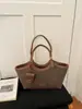 Bolso tote tejido de alta gama para mujer, nuevo bolso de hombro casual retro de otoño 2026, bolso de gran capacidad para el día a día