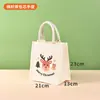 En stock: Bolsa de lona con diseño de Santa Claus para Navidad, bolsa de regalo, recuerdo de fiesta navideña, bolso de mano festivo