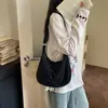 Bolsa Transversal de Lona Minimalista Retrô com Laço para Mulheres 2026 Nova Versátil Bolsa de Mão para o Dia a Dia Bolsa Dumpling