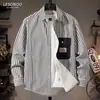 Camisa de manga larga a rayas para primavera y otoño para hombre, elegante y fresca, adecuada para adolescentes y estudiantes, corte holgado, con cuello, chaqueta fina