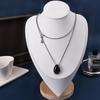 Collar de estilo frío con incrustaciones de ónix negro en forma de gota y diseño de nicho francés, elegante y ligero, cadena de lana de lujo, venta al por mayor
