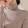 Suéter de capa base de cuello alto otoño e invierno nuevo estilo top de cuello de pelo jersey de manga larga tejido elegante ajuste ceñido tejido de punto blanco