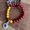 Pulsera de arena dorada púrpura de cinabrio de bajo contenido natural con colgante de paz, producto popular de venta al por menor en línea