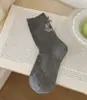 Calcetines retro de otoño e invierno con lazo floral suave para mujer, versátiles de media pantorrilla, sin costuras, modernos, de algodón, calcetines apilables para mujer