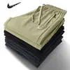 Pantalones Deportivos Casuales de Primavera y Otoño para Hombre, Tejido de Nylon Elástico, Cómodos y Transpirables, Pantalones Largos Lisos Versátiles para el Día a Día