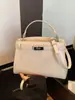 Bolsa Kelly da Moda Transfronteiriça para Mulheres, Nova Bolsa de Ombro Transversal Simples e Estilosa para Trabalho e Deslocamento, Pequena Bolsa Quadrada