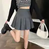 Saia midi plissada estilo retrô americano para mulheres, nova coleção primavera 2026, design anti-exposição, saia curta evasê sexy e estilosa