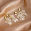 Pendientes Largos de Concha y Flor con Borlas para Mujer, Estilo Vacaciones de Verano Niche Coreano y Japonés, Pendientes de Gama Alta al por Mayor