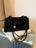 Bolso de hombro cruzado de moda 2026 con diseño de nicho nuevo y moderno decorado con cinturón, bolso cruzado personalizado dulce y genial