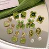 Pendientes de flor verde (2024), nuevos, de plata 925, con broche y diseño de nicho avanzado.