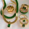 Europa y Estados Unidos INS viento joyería roja neta oro de 18 quilates acero inoxidable incrustado anillo de circón verde moda para damas anillo versátil
