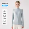 Nueva camiseta base de cuello alto versátil de corte ajustado para mujer, otoño e invierno 2026, top de manga larga de color liso ajustado