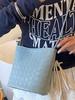 Bolso Tejido de Diseño Nicho de Moda para Mujer 2025 Nuevo Bolso Cruzado Verano Fresco Bolso Balde de Alto Valor