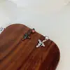 Dulce Fresca Chica Picante Serpiente Enroscada Cruz Hueso de la Oreja Clavo de Oreja Nicho Diseño de Sentido Avanzado Pendientes Europeos y Americanos Pendientes Elegantes de Moda