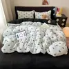 Nuevo juego de sábanas de invierno gruesas para niños, diseño de dibujos animados, terciopelo de leche, juego de cuatro piezas con faldón de cama, fabricante mayorista de dropshipping