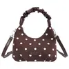 Bolso de nube de lunares estilo coreano para mujer, bolso de mano plisado, nuevo diseño de nicho 2026, bolso cruzado de moda y versátil para el día a día.