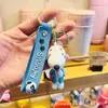 Novo chaveiro de desenho animado do Snoopy pingente de bolsa de casal chaveiro de carro boneca de borracha macia pequeno presente atacado