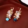 Brincos de prata com agulha europeus e americanos transfronteiriços com diamantes e zircônia, brincos de franja, brincos de nicho de alta qualidade, acessórios versáteis para vestidos de noite para mulheres