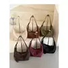Bolsa de mano estilo casual modelo transfronterizo 2026 nuevo, bolsa de hombro y cruzada para mujer, gran capacidad para el trabajo, venta al por mayor directa desde la fuente