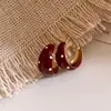Pendientes de aro redondos con lunares y efecto de goteo de aceite estilo coreano ins, pendientes retro de alta gama de moda con un diseño único para mujer