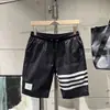 Shorts de seda helada de secado rápido para hombre de verano, tendencia ins, nuevos pantalones de playa, pantalones cortos casuales deportivos ajustados transpirables