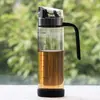 Pote de óleo de vidro para cozinha doméstica, abertura e fechamento automáticos, garrafa de óleo de vidro, vidro de borossilicato alto resistente ao calor, garrafa de óleo à prova de vazamentos