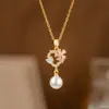 Collar de cereza roja de vino de alta calidad para mujer 2024, nueva moda, diseño de nicho de lujo ligero, cadena de clavícula, exquisita cadena para el cuello