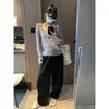 Además, el nuevo modelo de otoño son unos pantalones de traje de pierna ancha de mezcla de Tencel y lana con un diseño moldeador de piernas y pliegues tridimensionales MQ1661