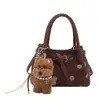 Tendencia transfronteriza bolso de cubo de mano fresco para mujer bolso 2026 otoño nuevo de lunares elegante bolso de hombro único bolso cruzado para ir al trabajo
