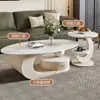 Nova mesa de centro oval em pedra sinterizada de luxo leve estilo italiano para apartamentos pequenos, sala de estar moderna, uso doméstico simples, combinação de armazenamento de alta qualidade