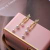 Nuevo Diseño Nicho Aretes de Borla de Perlas de Línea Cruzada de Alta Gama Aretes Elegantes de Lujo Ligero para Damas Combinan con Todo