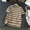 Nova camiseta de moda estilo coreano 2026, gola redonda, manga longa, para mulheres, modelagem solta, emagrecedora, top versátil, base listrada color-block
