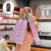 Adecuado para el estuche de llave de control remoto para automóviles Dongfeng Venucia V, VX6 y VDDi, una carcasa protectora de alta gama con una hebilla decorativa