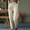 Calças casuais novas com forro de fleece sem caxemira cintura elástica calças estilo harém finas cor sólida moda outono e inverno calças longas femininas